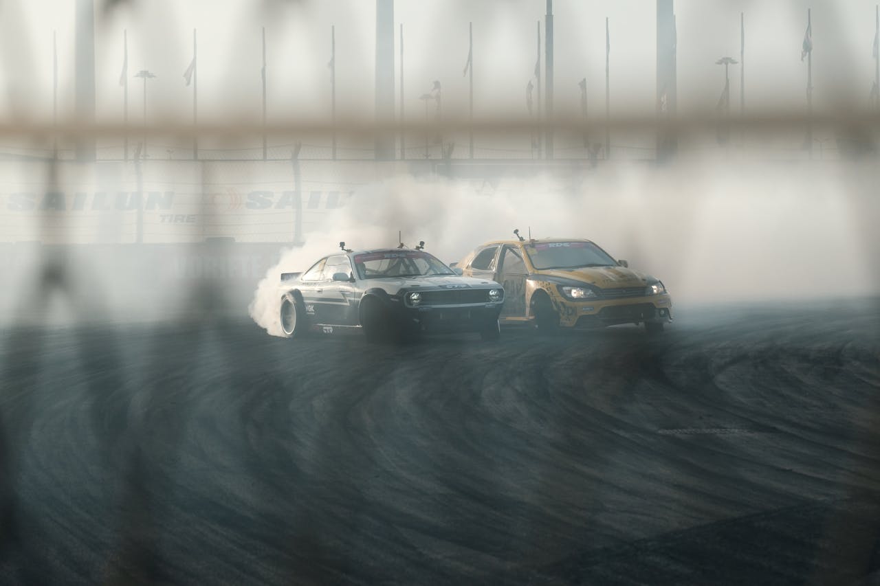 menu-13 Thrilling car drift racing with smoke effects on a track. Dynamic action scene.