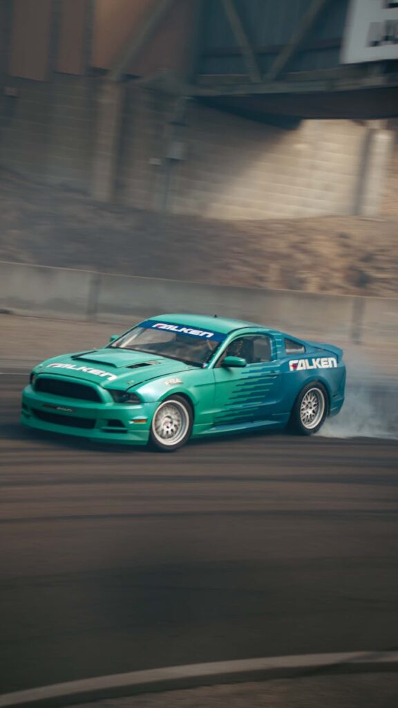 A Ford Mustang performs an impressive drift at a Salinas, CA event.